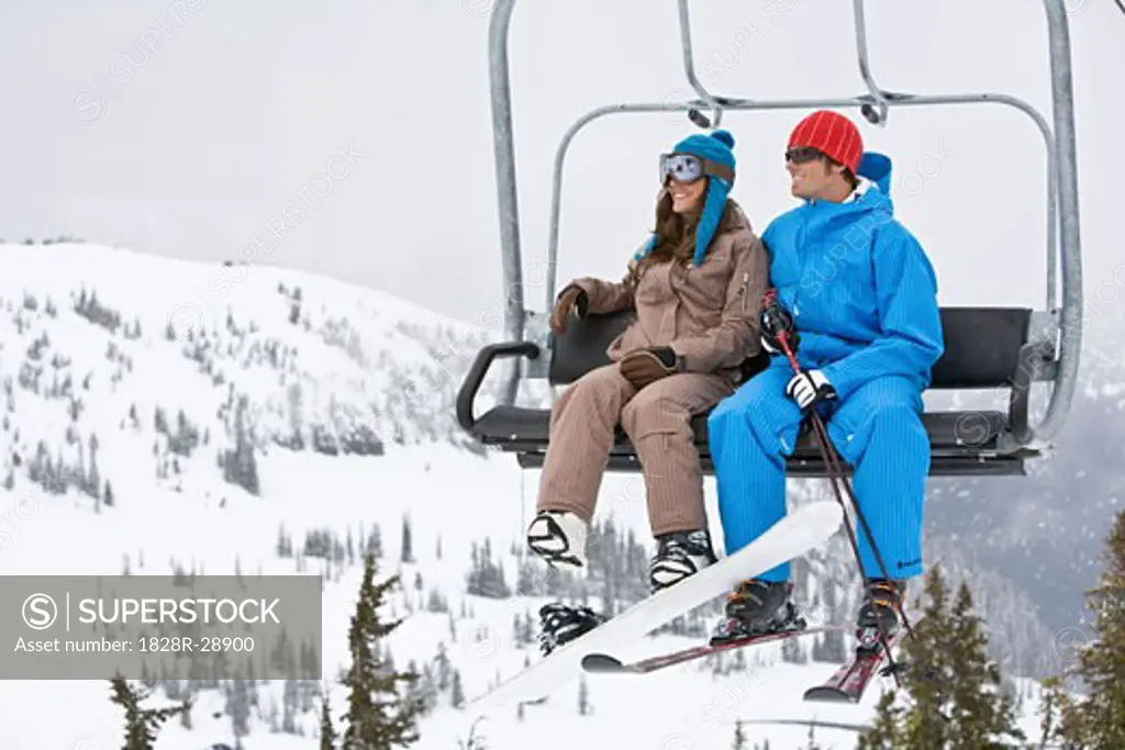 Couple on Ski Lift, Whistler-Blackcomb, British Columbia, Canada   