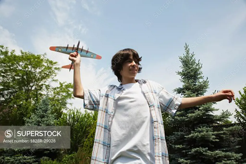 Boy with Toy Plane   