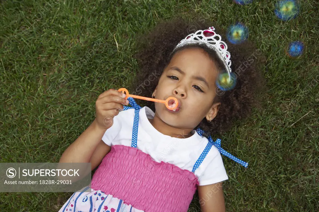 Girl Blowing Bubbles   