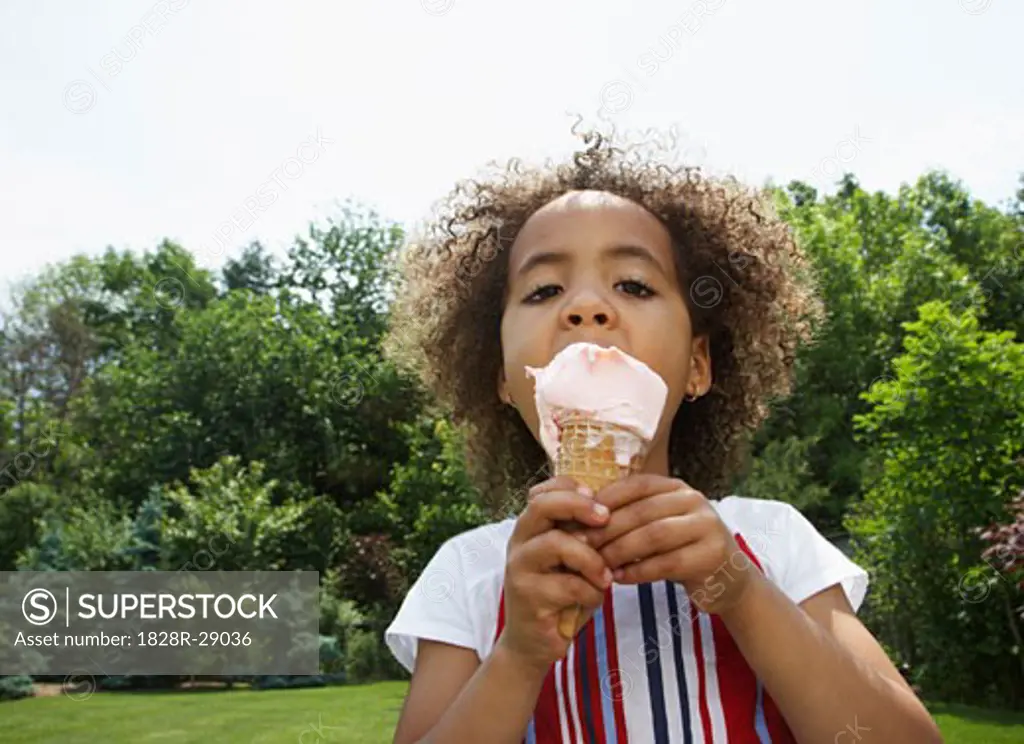Girl Eating Ice Cream Cone   