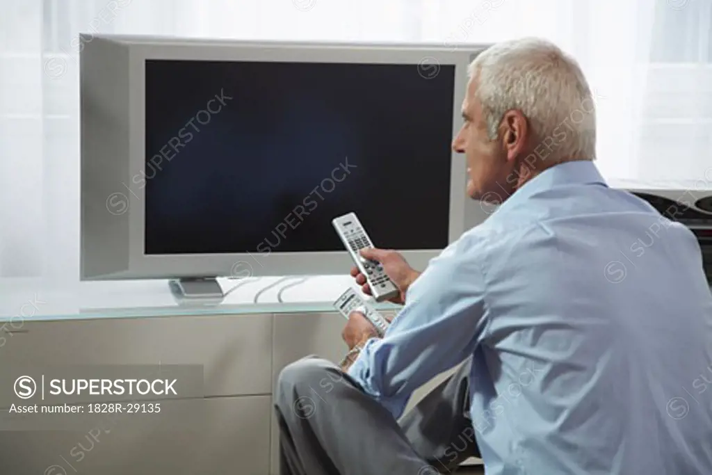 Man Trying to Watch Television   