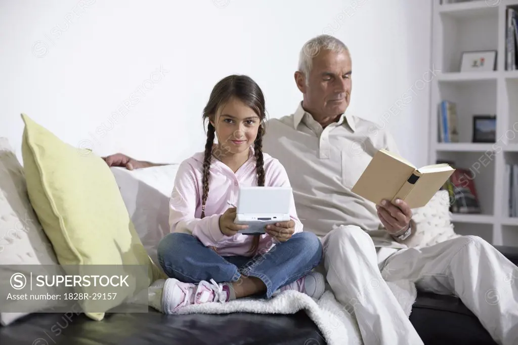 Grandfather and Granddaughter at Home   