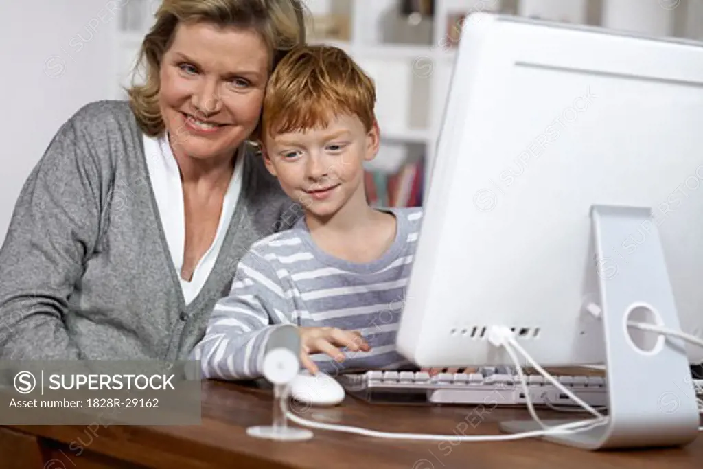 Grandmother and Grandson Using Computer   
