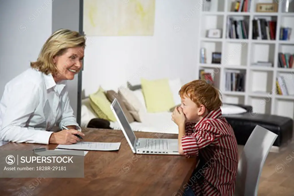 Grandmother and Grandson Using Laptop   