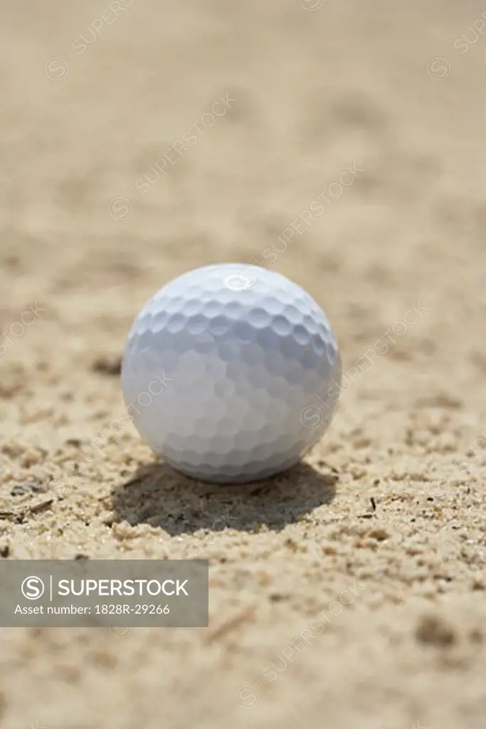 Close-Up of Golf Ball in Sand Trap   