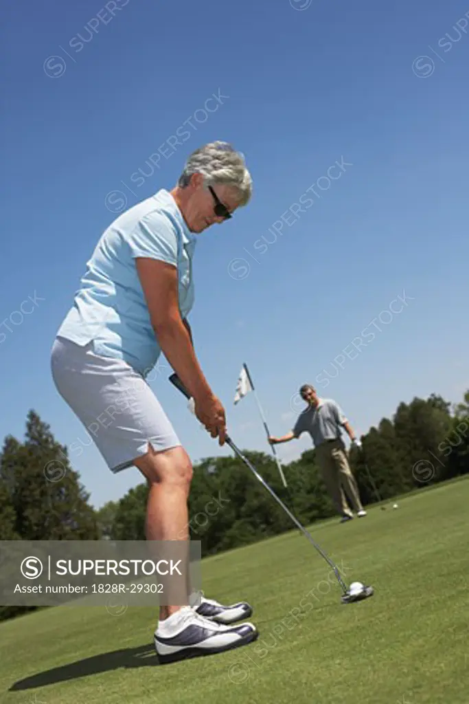 Couple Golfing   