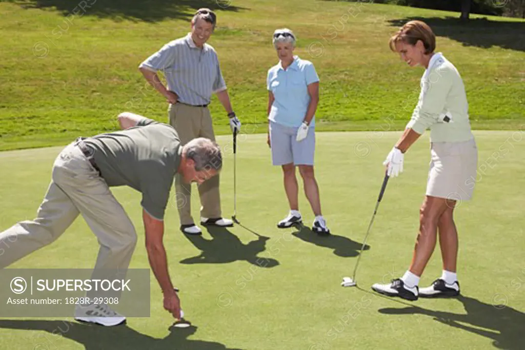 People Playing Golf   