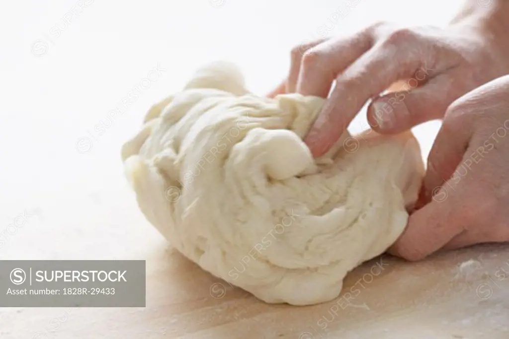 Hands Kneading Dough   