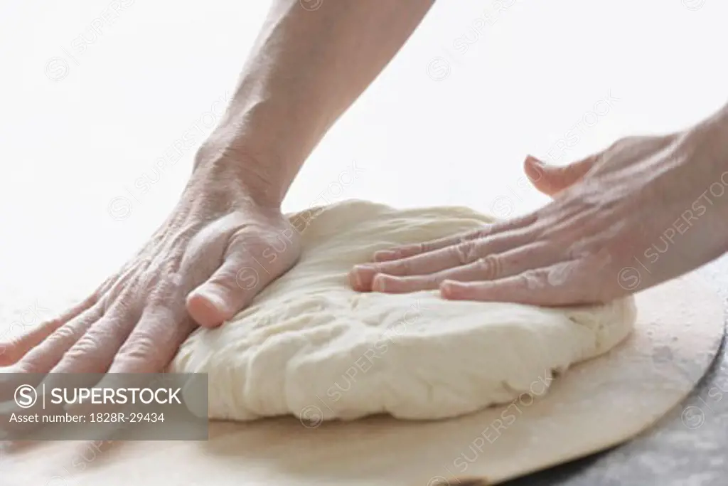 Hands Kneading Dough   