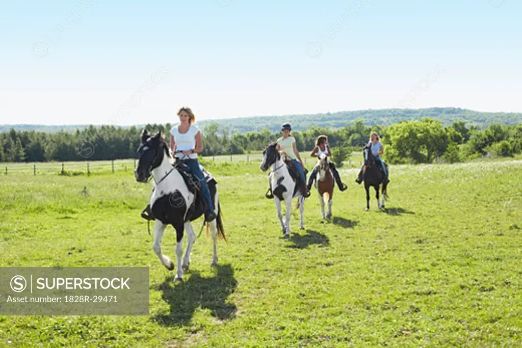 Women Horseback Riding   