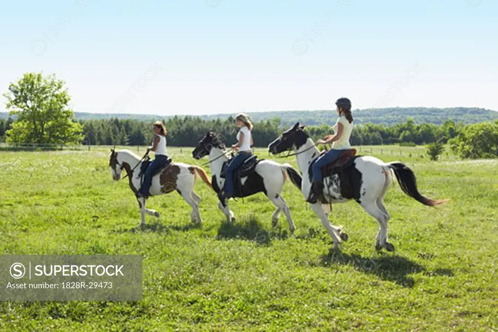 Women Horseback Riding   