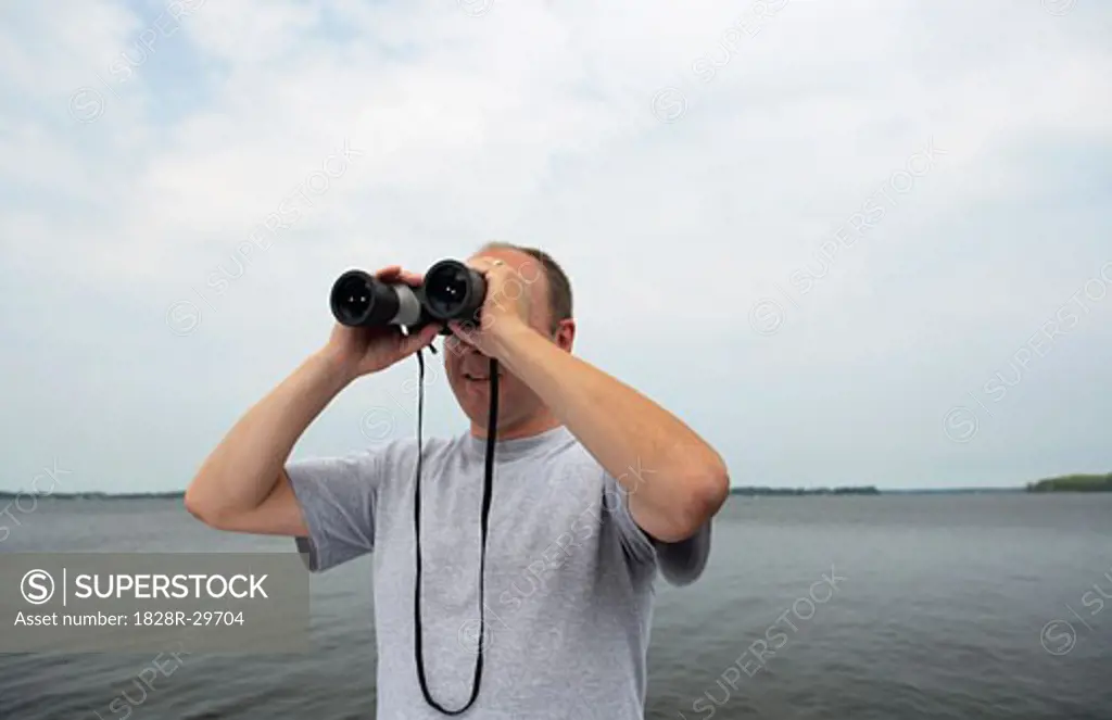 Man Using Binoculars   