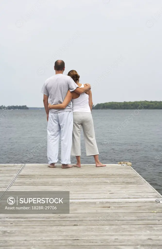 Couple Standing on Dock   