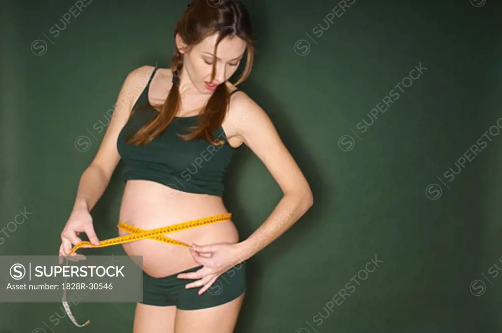 Pregnant Woman Measuring Stomach   