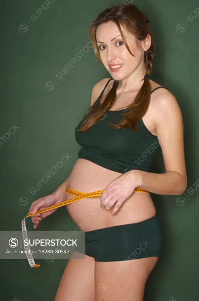 Pregnant Woman Measuring Stomach   