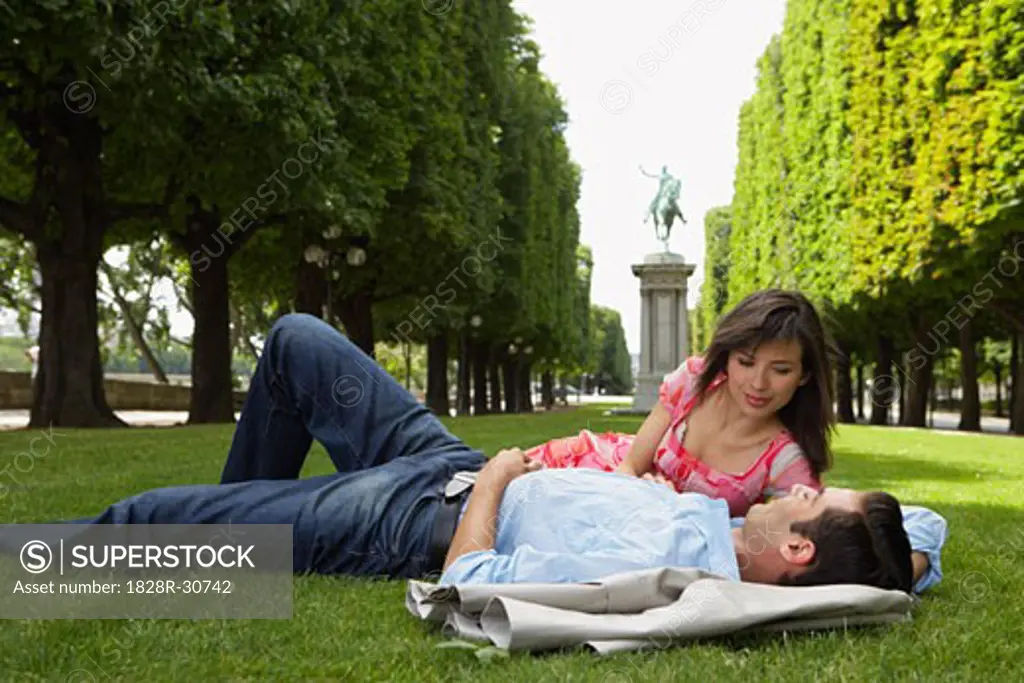 Couple Lying Down at Park   