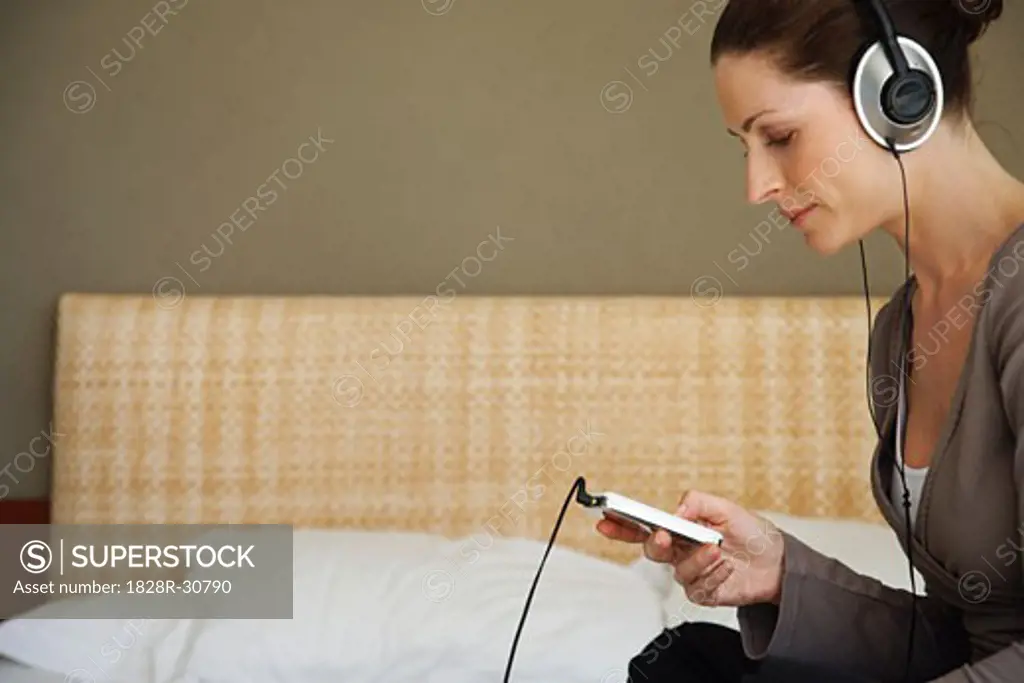 Woman Listening to Mp3 Player   