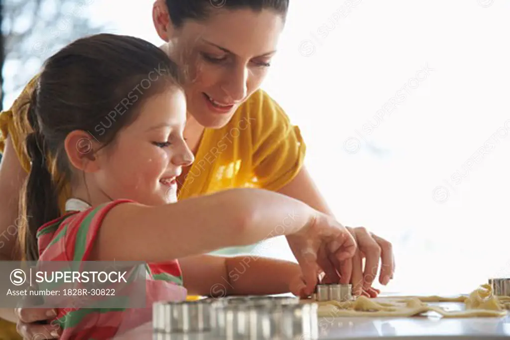 Mother and Daughter Making Cookies   