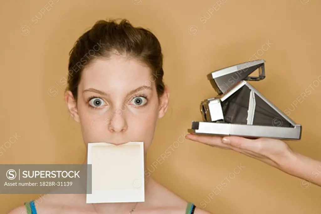 Portrait of Woman with Polaroid   