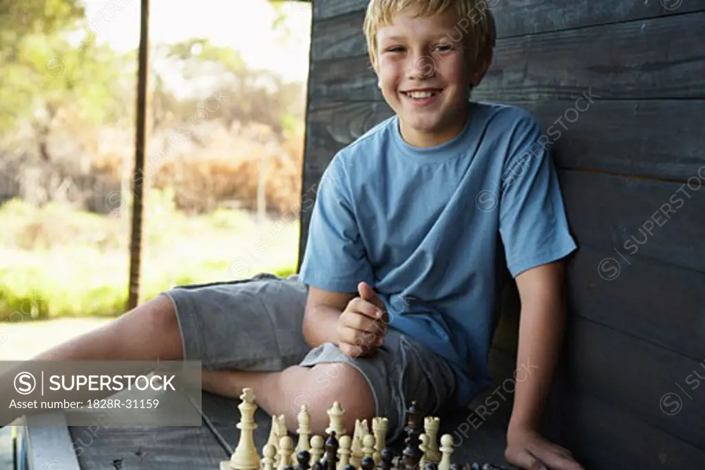 Boy Playing Chess   