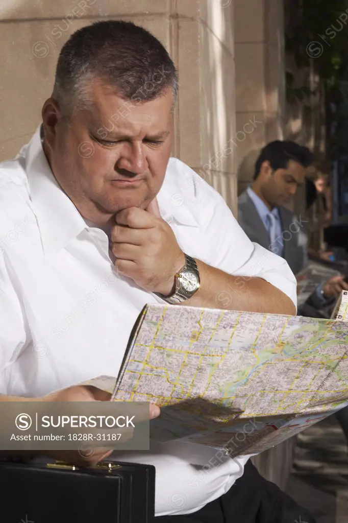 Man Looking at Map   