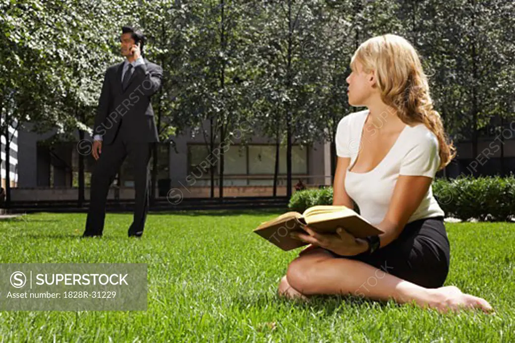 Businessman and Businesswoman Outdoors   