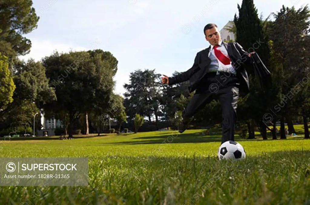 Businessman Playing Soccer   