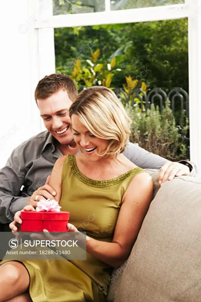 Man Giving Gift to Woman   