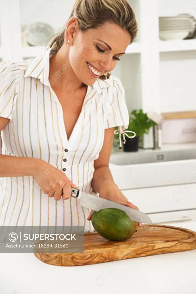 Woman in Kitchen, Preparing Food   