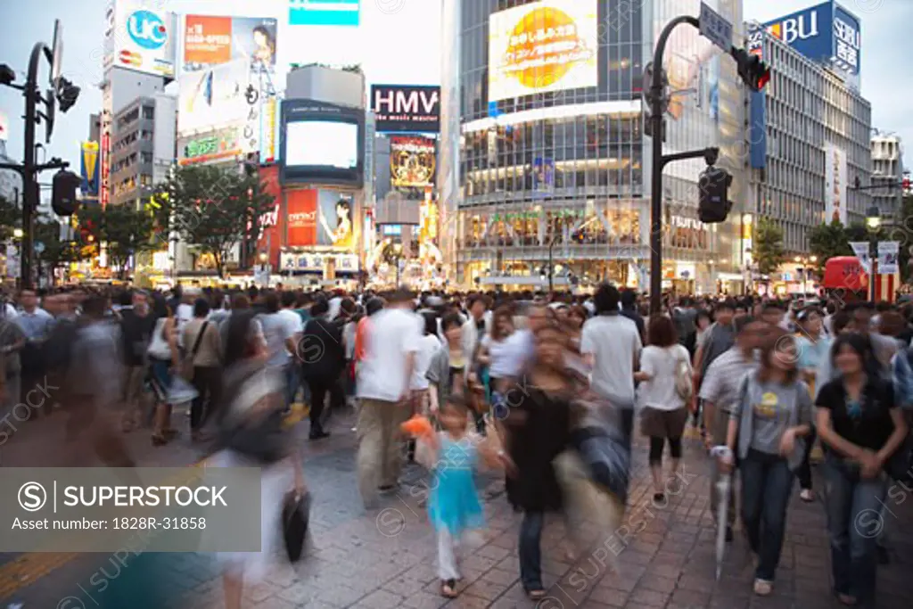 People Crossing Street at Shibuya Station, Tokyo, Japan   