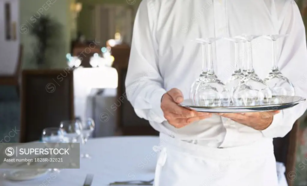 Waiter Carrying Tray of Wine Glasses   
