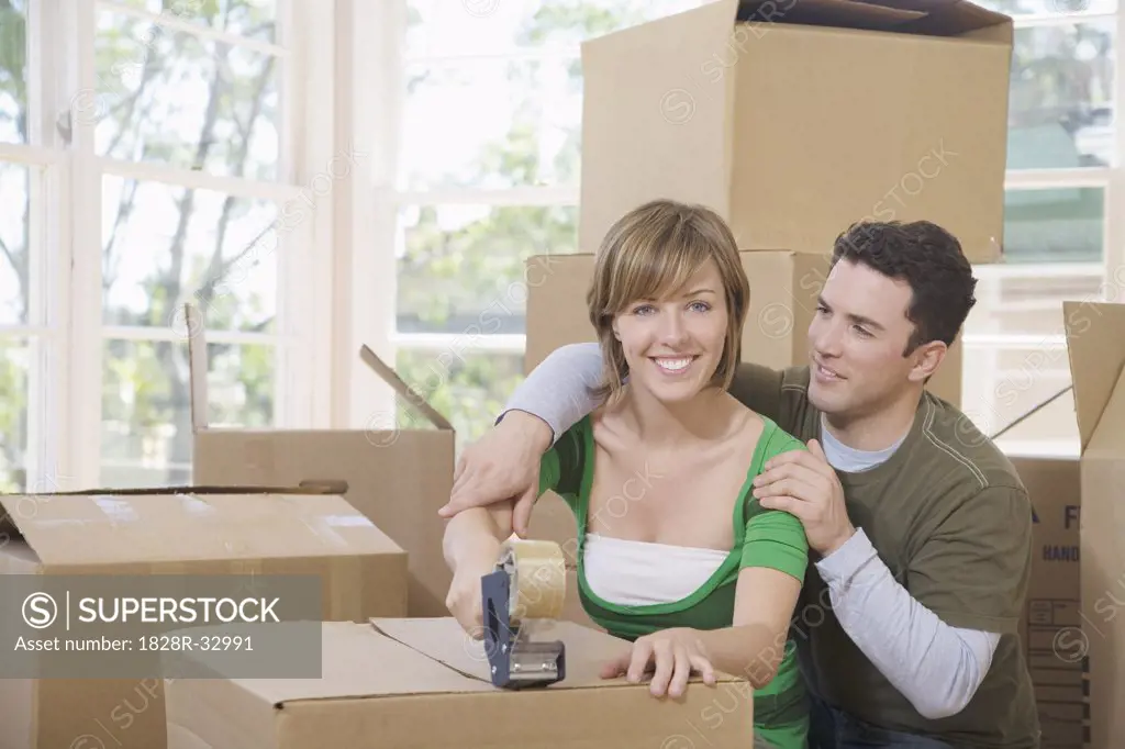 Couple Moving Into New Home   