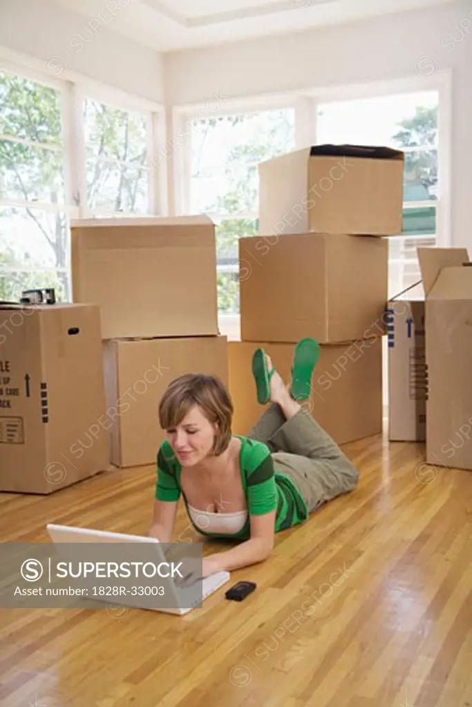 Woman Moving Into New Home   