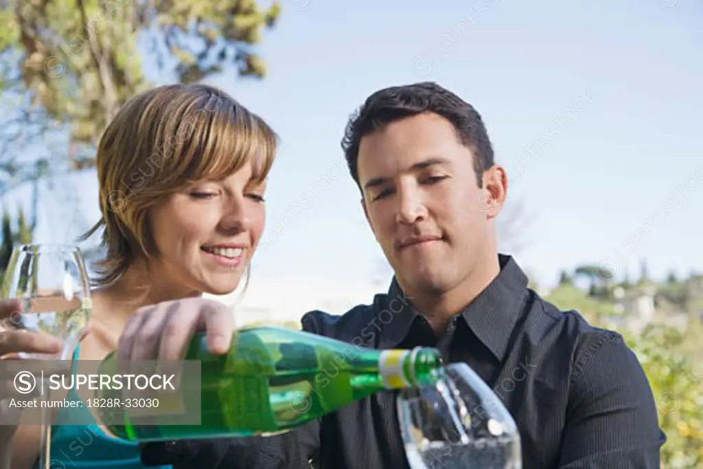 Couple Drinking Sparkling Water   