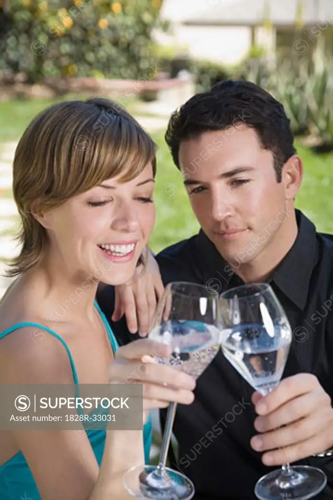 Couple Drinking Sparkling Water   