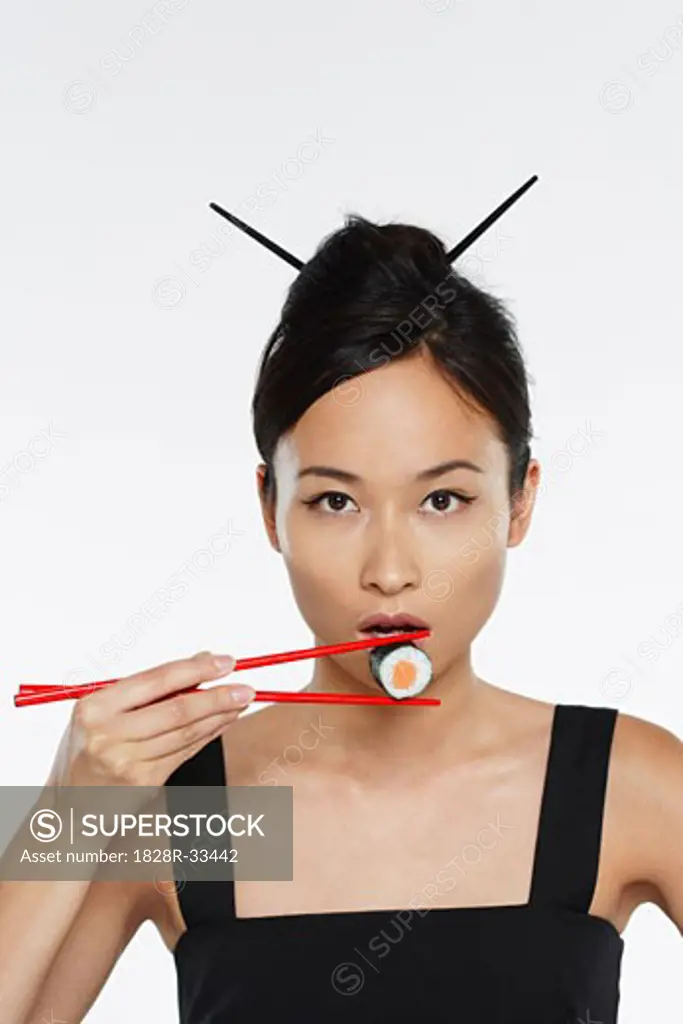 Woman Eating Sushi   