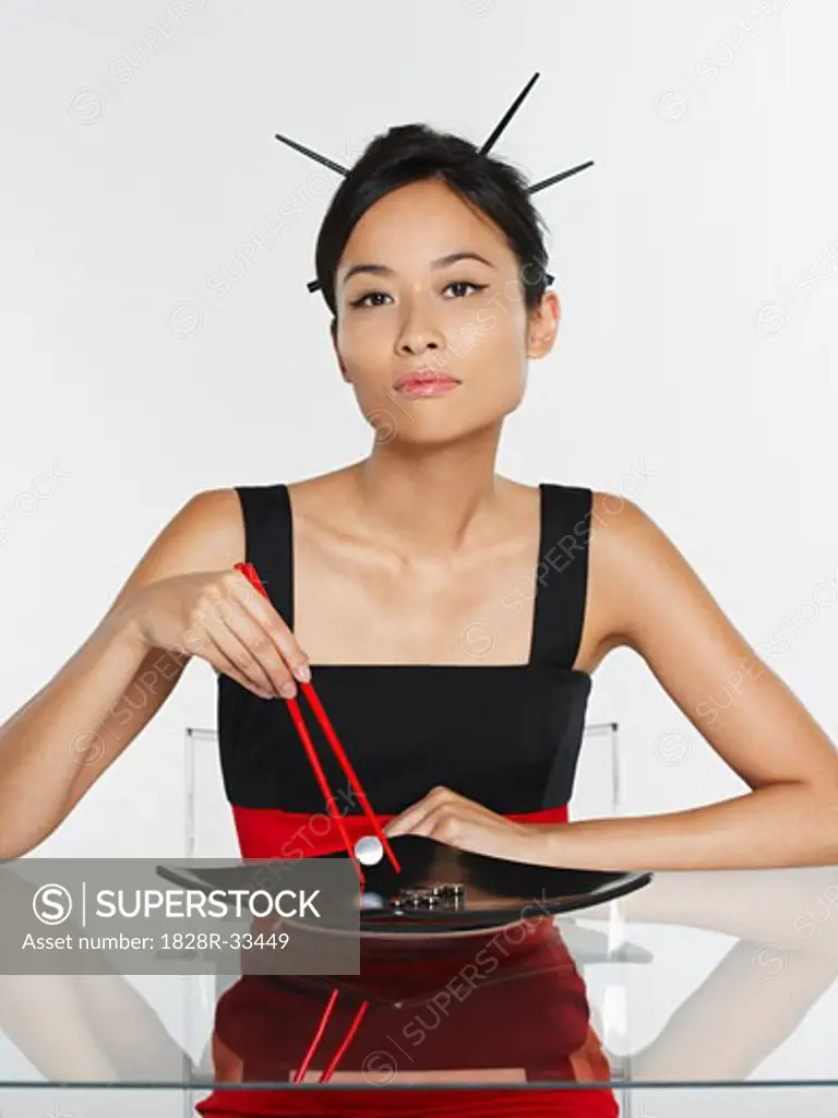 Woman Eating Sushi   