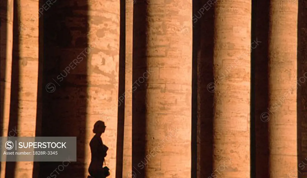 Woman near Pillars at Saint Peter's Square Vatican City, Rome, Italy   