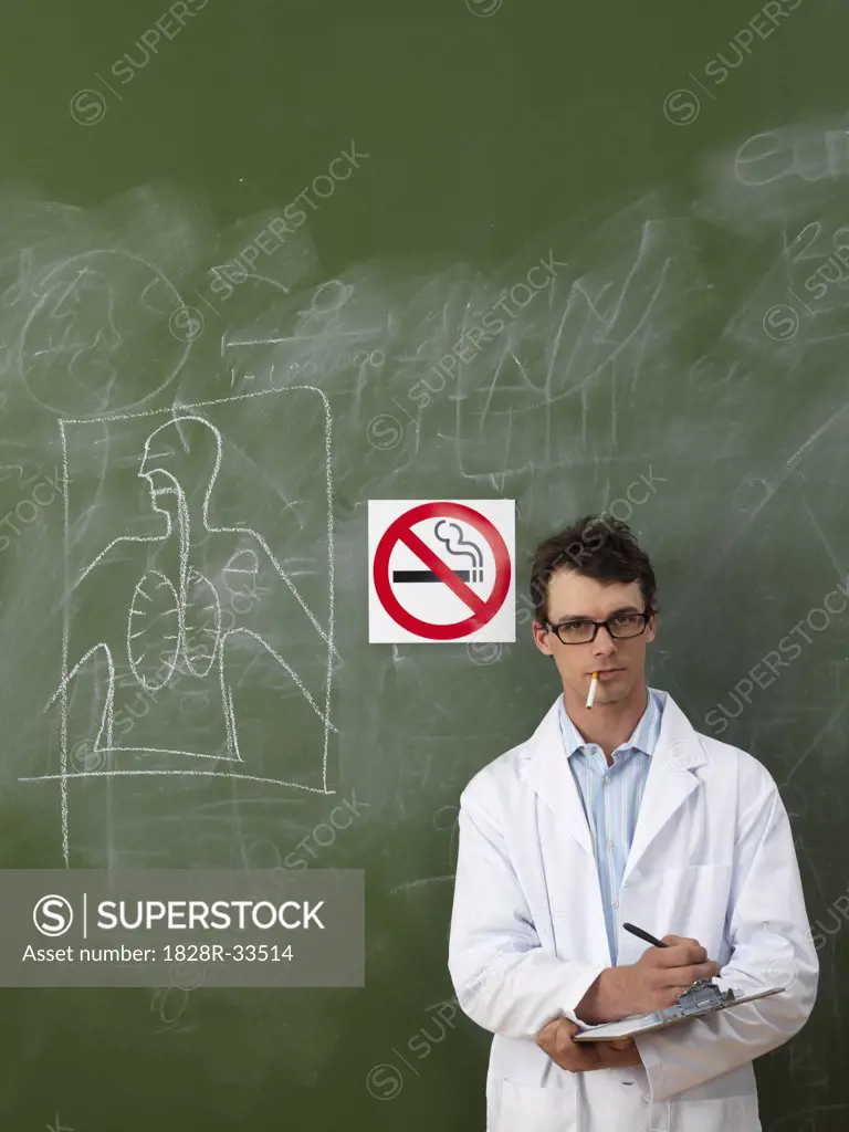 Scientist Smoking near No Smoking Sign   
