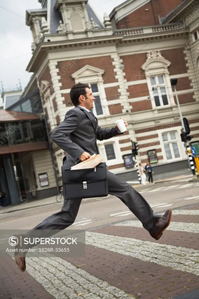 Man Running Across Street, Amsterdam, Netherlands   
