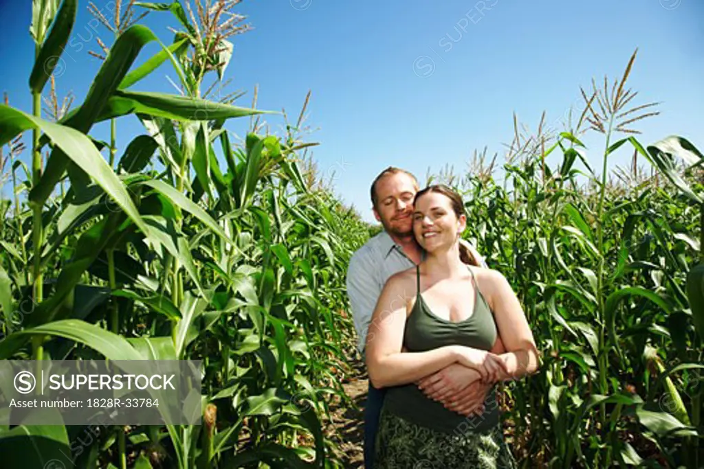 Portrait of Couple in Cornfield   