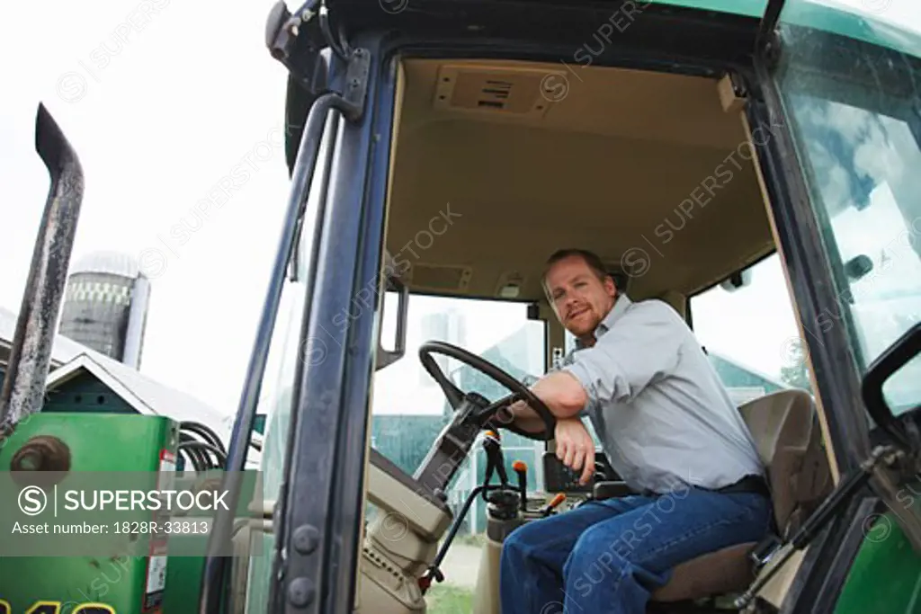 Portrait of Farmer in Tractor   