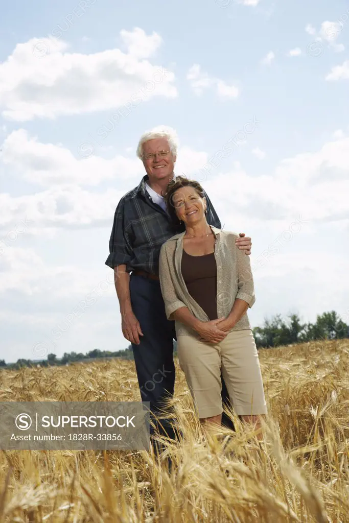 Portrait of Couple in Grain Field   