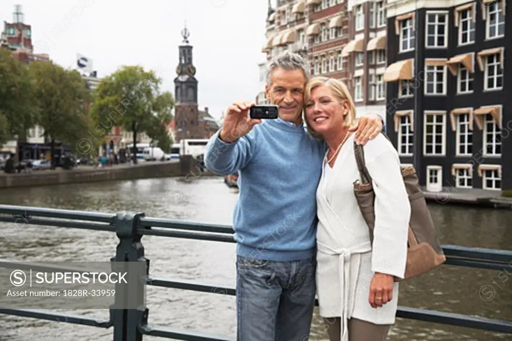 Couple Taking Photo of Themselves Amsterdam, Netherlands   