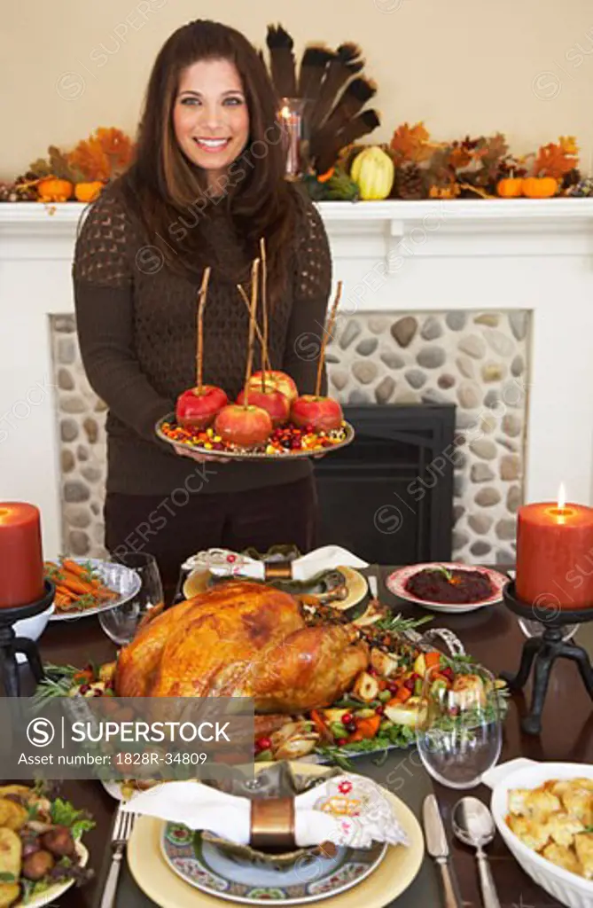Woman Serving Thanksgiving Dinner  