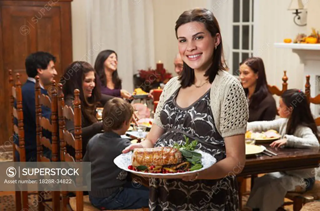 Woman with Food for Family Dinner   