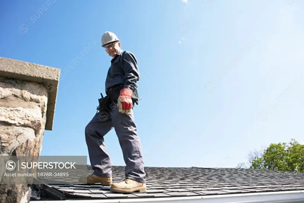 Worker on Roof   