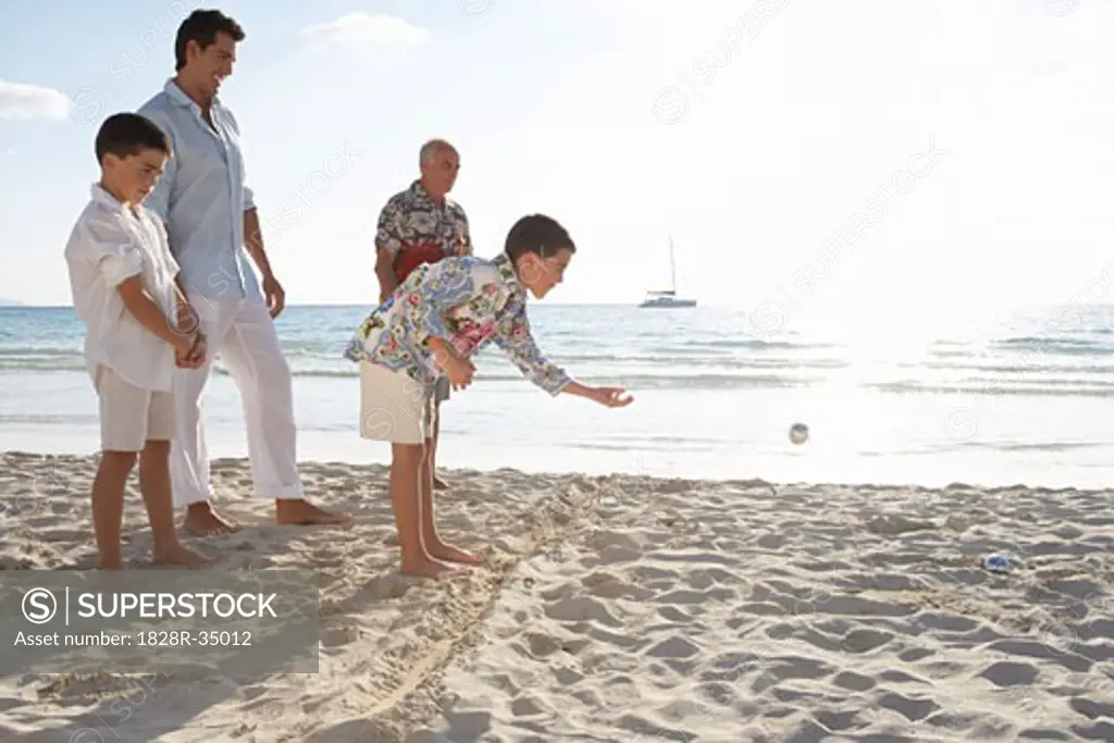 Family Playing Bocce on the Beach   