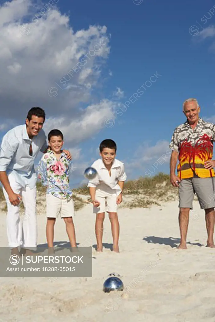 Family Playing Bocce on the Beach   