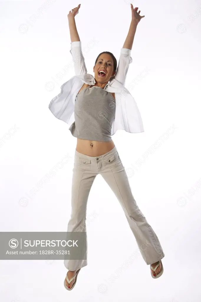 Portrait of Woman Jumping in Air   